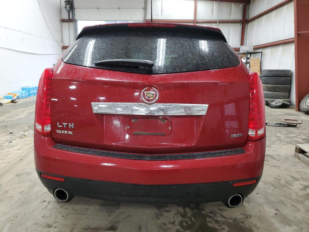 2012 Cadillac SRX VIN 3GYFNGE39CS572229 Copart auction photo, front end / minor dent/scratches damage thumbnail 6