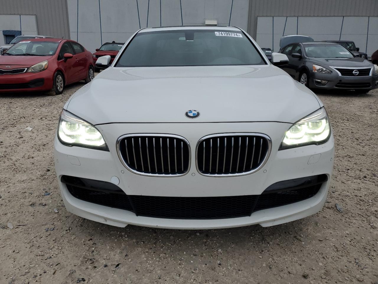 2013 BMW 7er VIN WBAYA8C54DC996569 Copart auction photo, rear end damage thumbnail 5