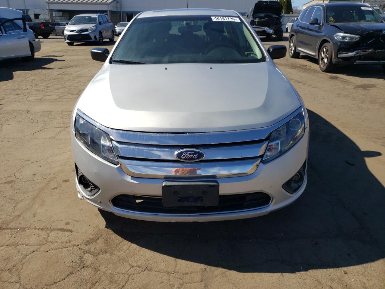 2012 Ford Fusion VIN 3FAHP0HA6CR117541 Copart auction photo, undercarriage / side damage thumbnail 5