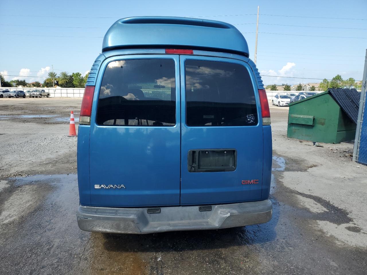 1999 GMC Savana VIN 1GDFG15R2X1044777 Copart auction photo, burn - engine damage thumbnail 6