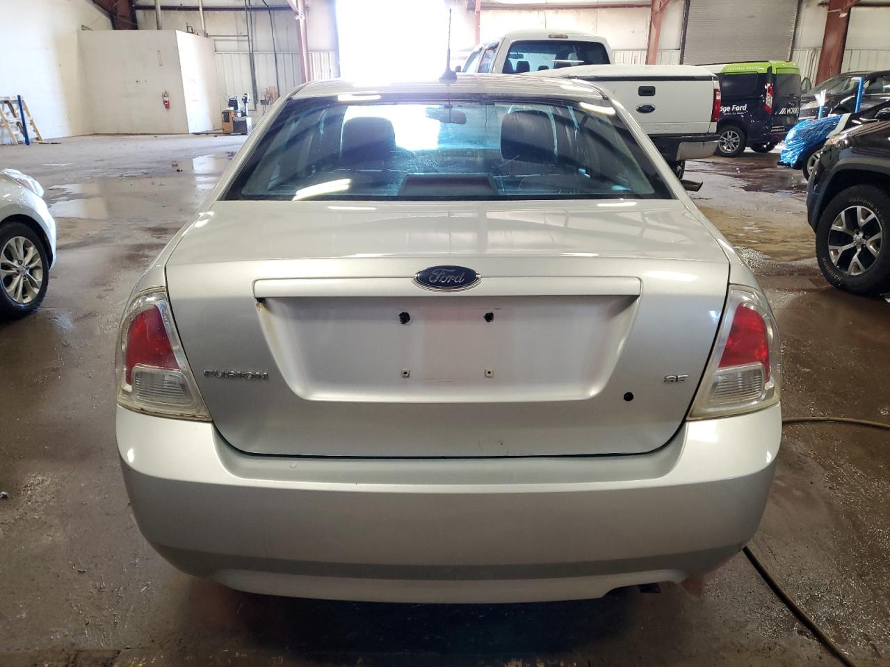 2009 Ford Fusion VIN 3FAHP07ZX9R206478 Copart auction photo, front end / side damage thumbnail 6