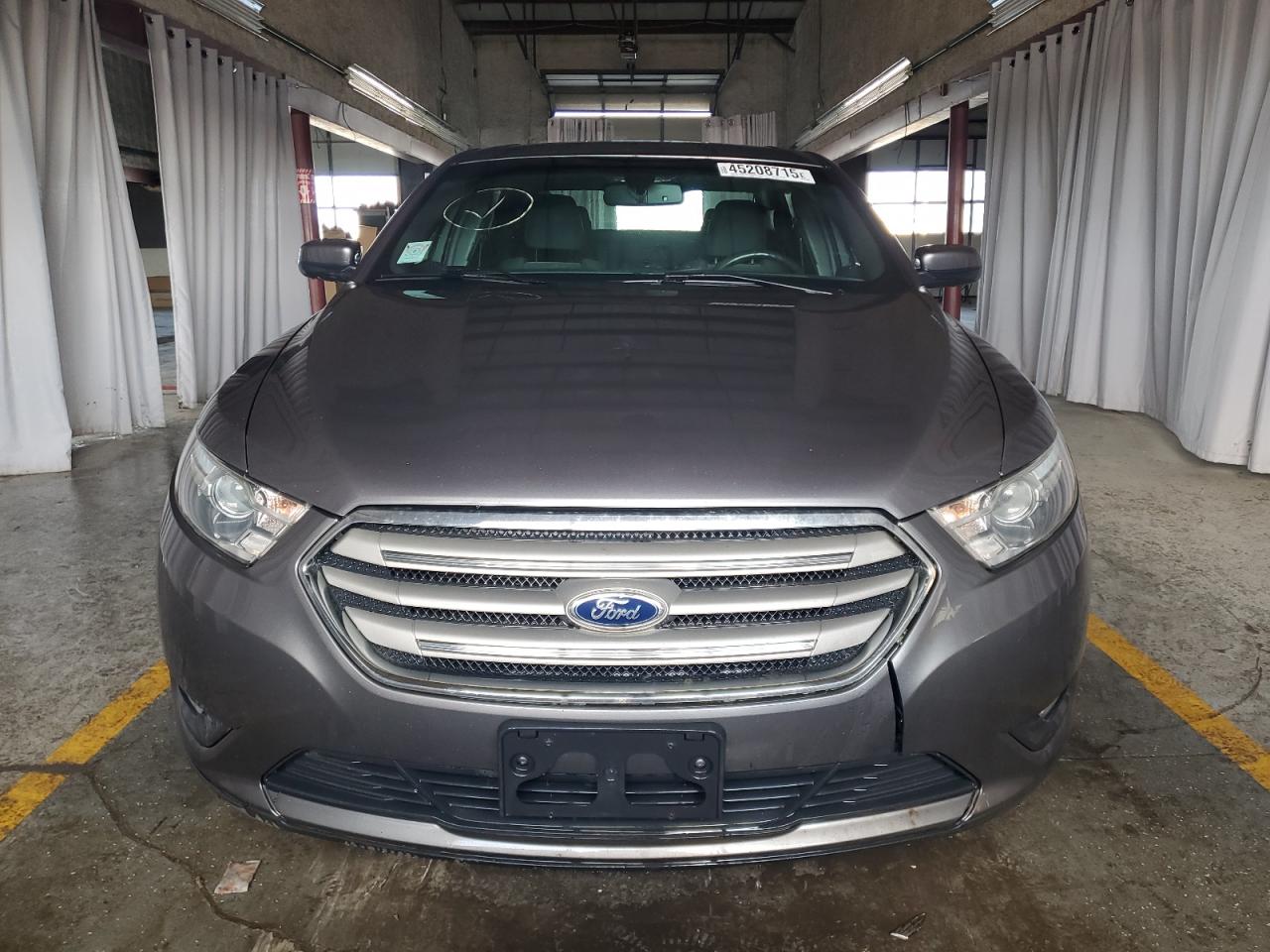 2013 Ford Taurus VIN 1FAHP2H82DG185143 Copart auction photo, front end / minor dent/scratches damage thumbnail 5