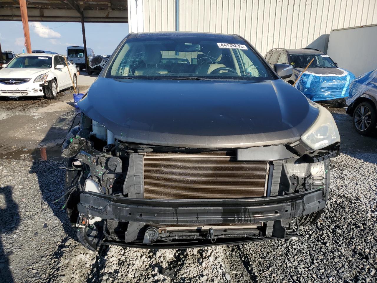 2013 Hyundai Santa Fe VIN 5XYZU3LB8DG093649 Copart auction photo, front end / rear end damage thumbnail 5