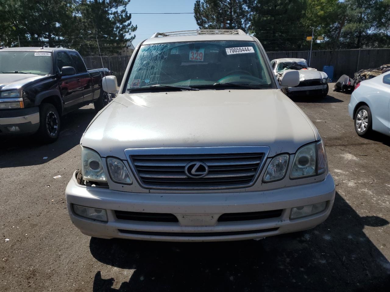 2004 Lexus LX VIN JTJHT00W843544262 Copart auction photo, side / front end damage thumbnail 5