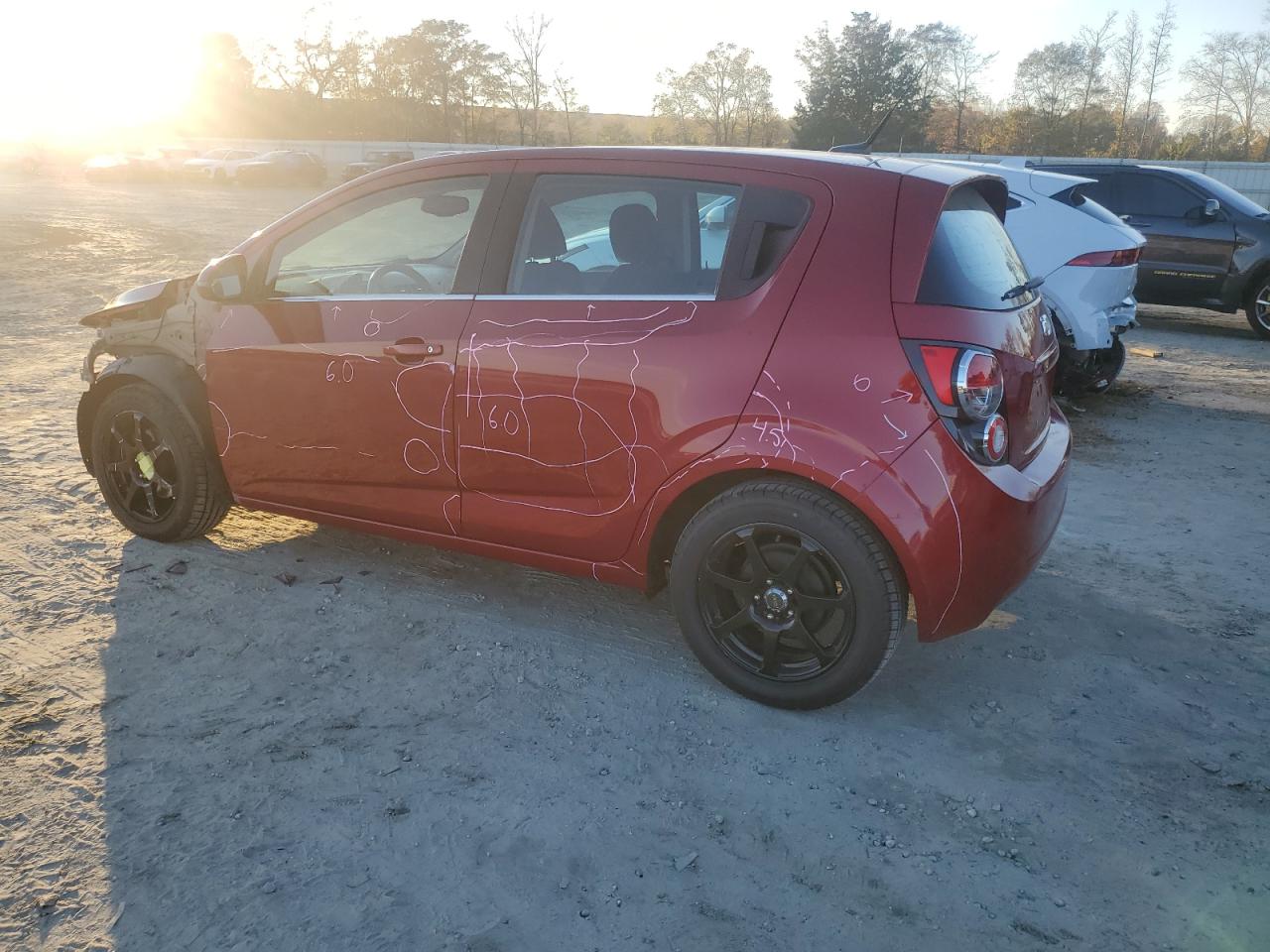 2012 Chevrolet Sonic VIN 1G1JC6SH1C4115052 Copart auction photo, front end / minor dent/scratches damage thumbnail 2
