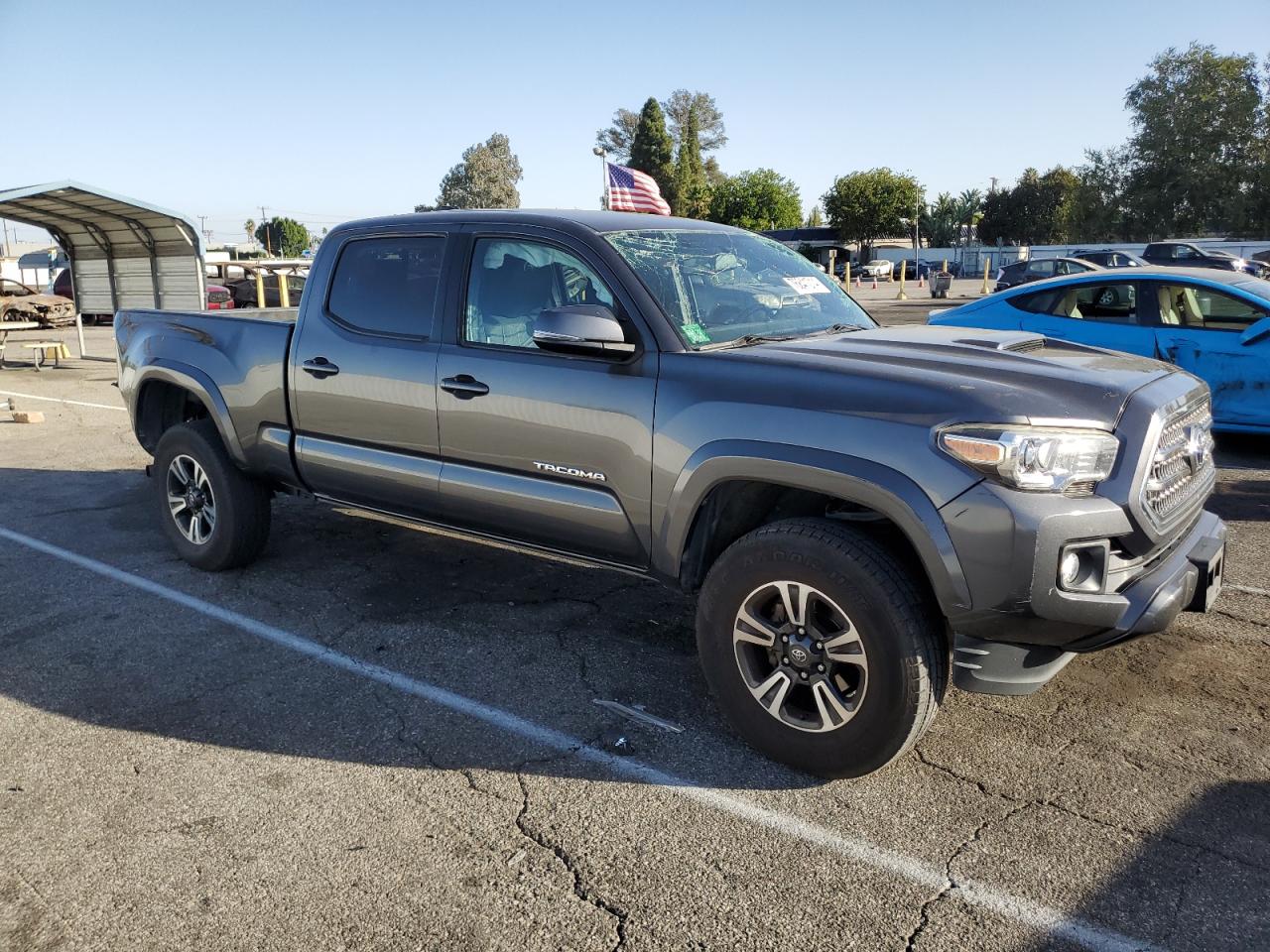 2016 Toyota Tacoma VIN 3TMBZ5DN1GM005717 Copart auction photo, rollover damage thumbnail 4