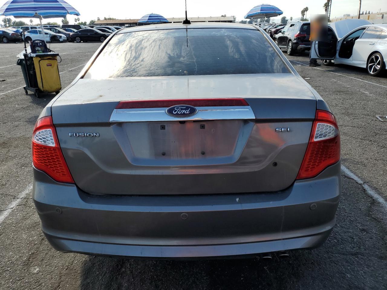 2011 Ford Fusion VIN 3FAHP0JA6BR128371 Copart auction photo, minor dent/scratches damage thumbnail 6