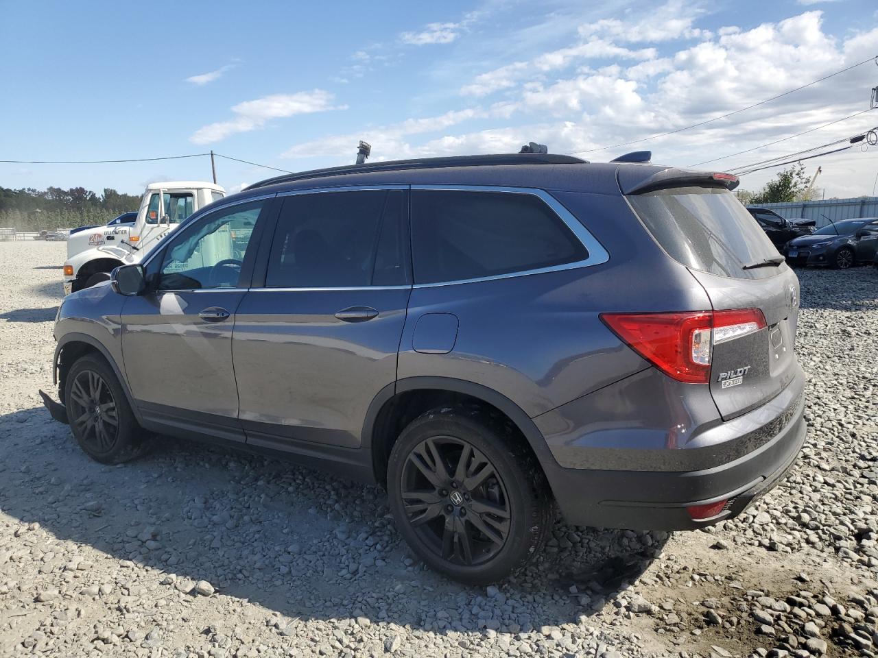 2021 Honda Pilot VIN 5FNYF6H29MB099662 Copart auction photo, side / front end damage thumbnail 2
