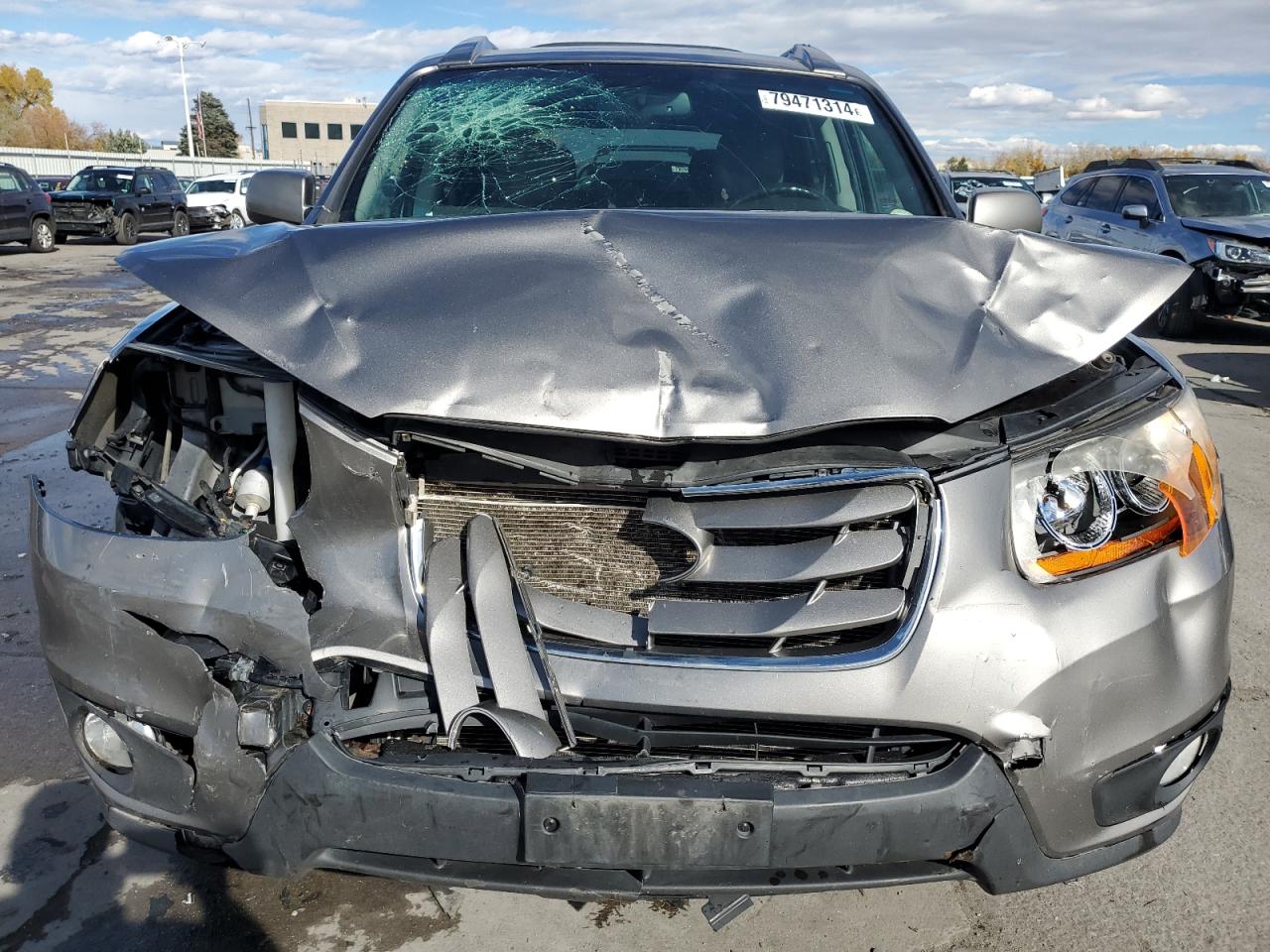 2011 Hyundai Santa Fe VIN 5XYZHDAG5BG031471 Copart auction photo, front end / side damage thumbnail 5