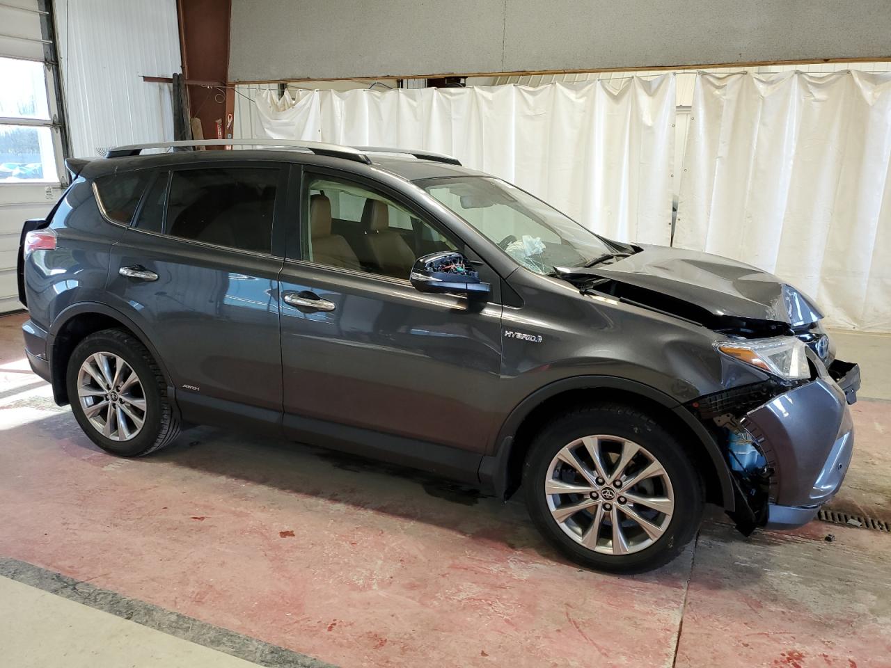 2018 Toyota RAV 4 VIN JTMDJREV4JD178866 Copart auction photo, front end damage thumbnail 4