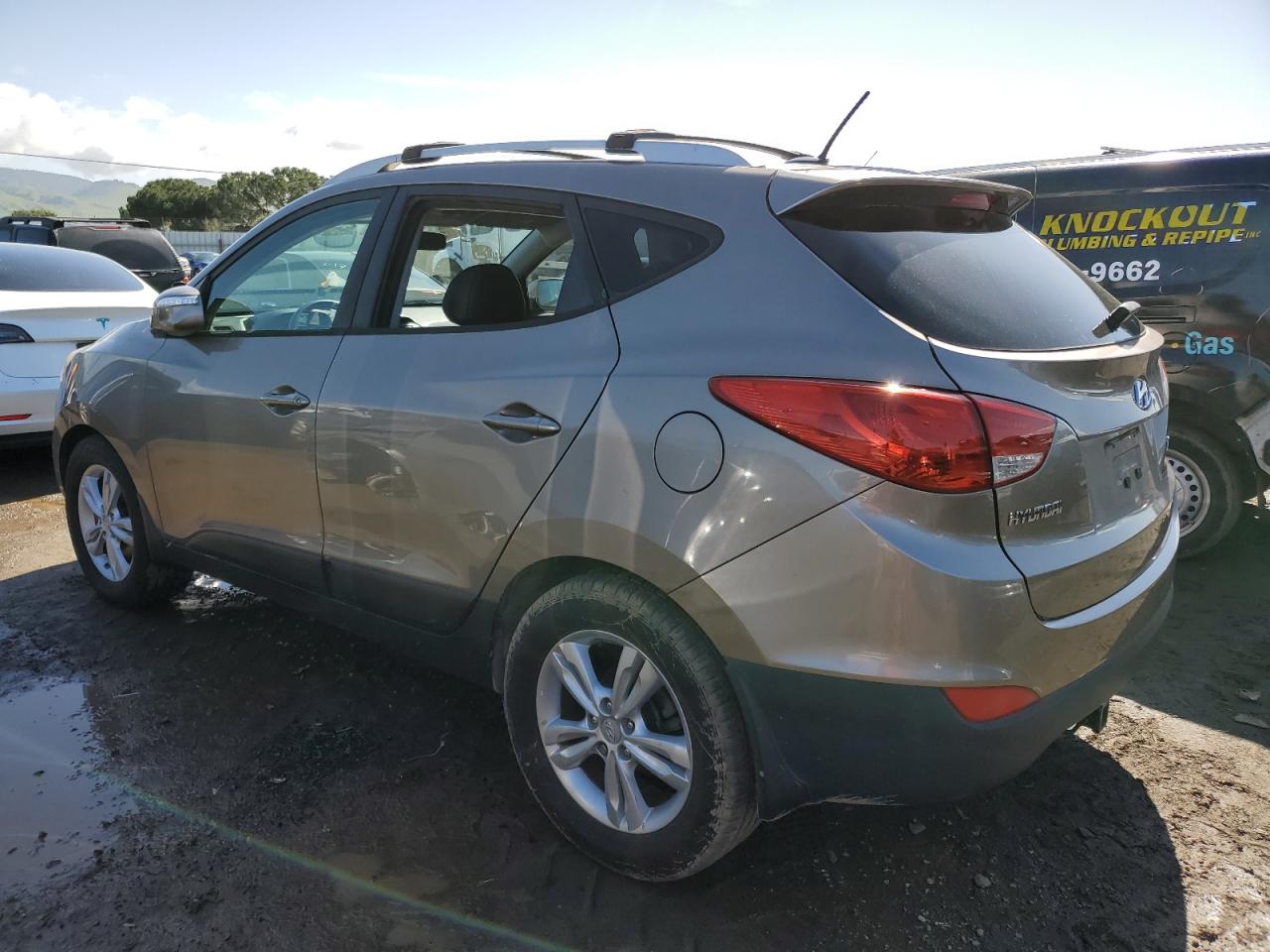 2012 Hyundai Tucson VIN KM8JU3ACXCU445650 Copart auction photo, vandalism damage thumbnail 2