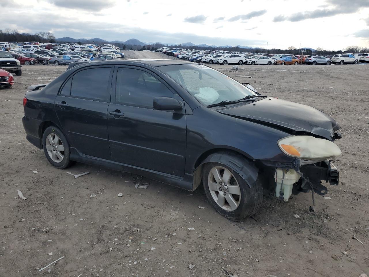 2004 Toyota Corolla VIN 1NXBR32EX4Z269786 Copart auction photo, all over damage thumbnail 4