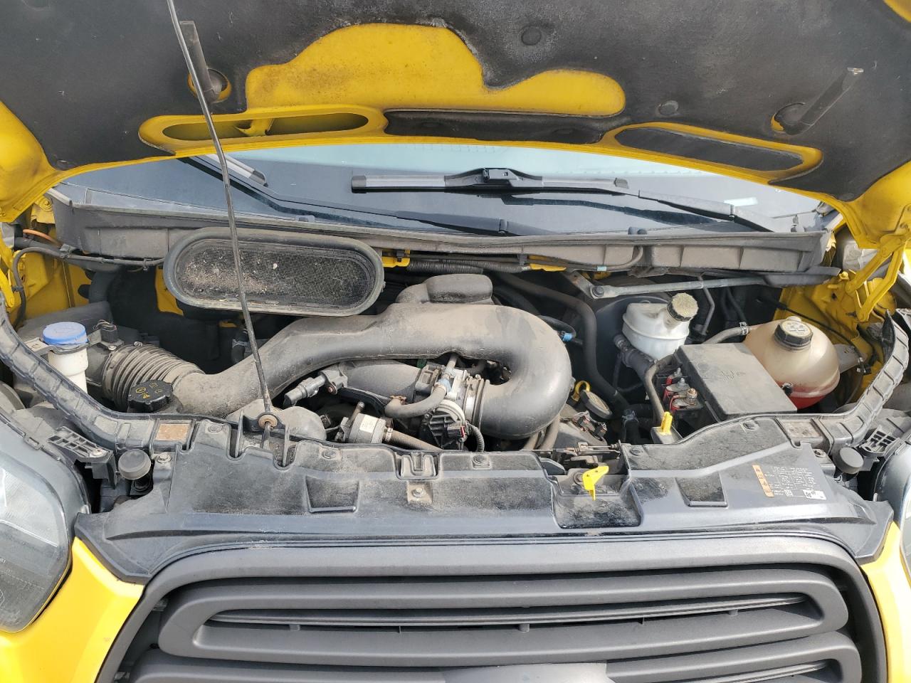 2015 Ford Transit VIN 1FTCR3XM4FKA30063 Copart auction photo, minor dent/scratches damage thumbnail 12