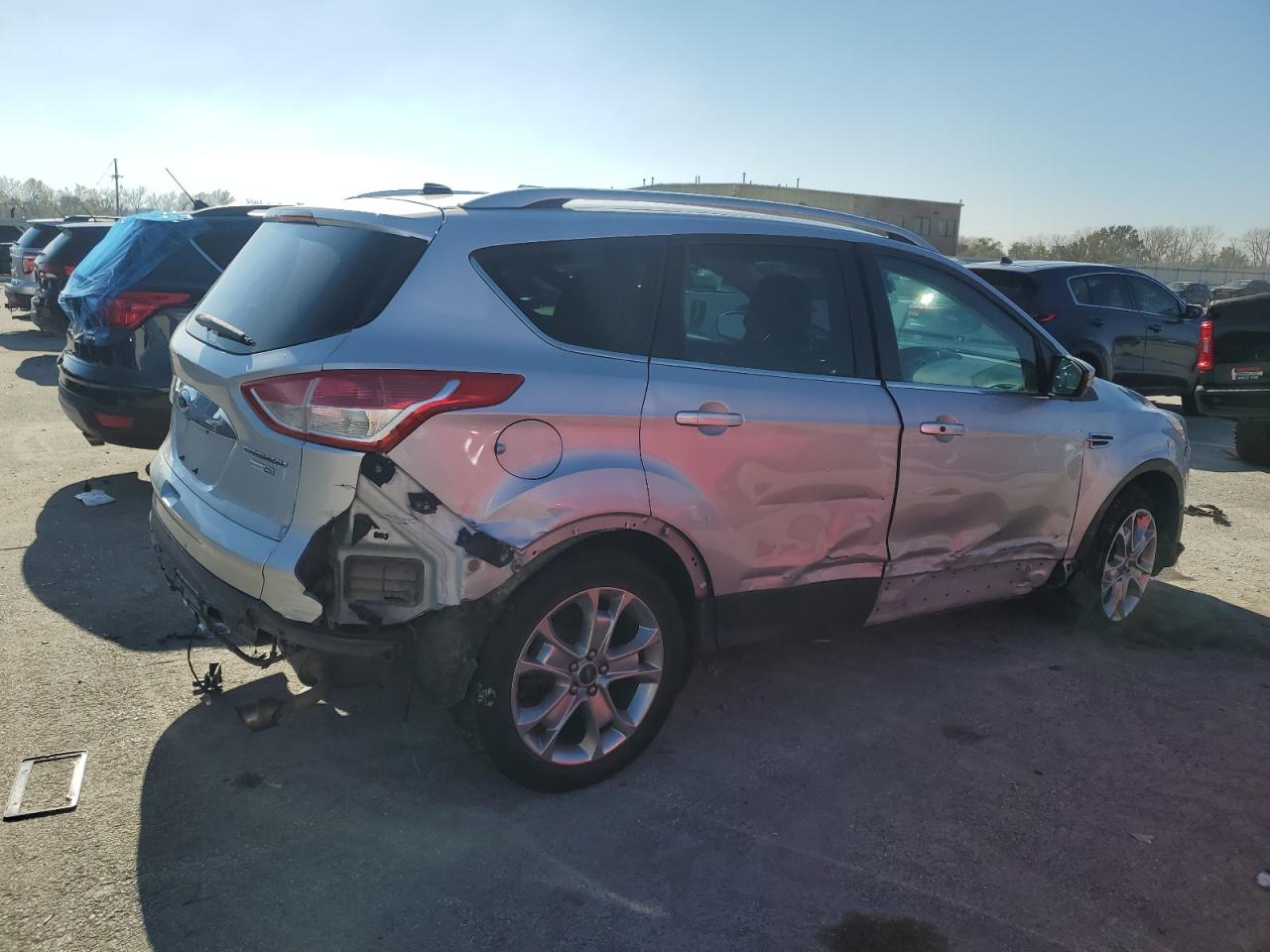 2014 Ford Escape VIN 1FMCU9J98EUB00779 Copart auction photo, side / front end damage thumbnail 3