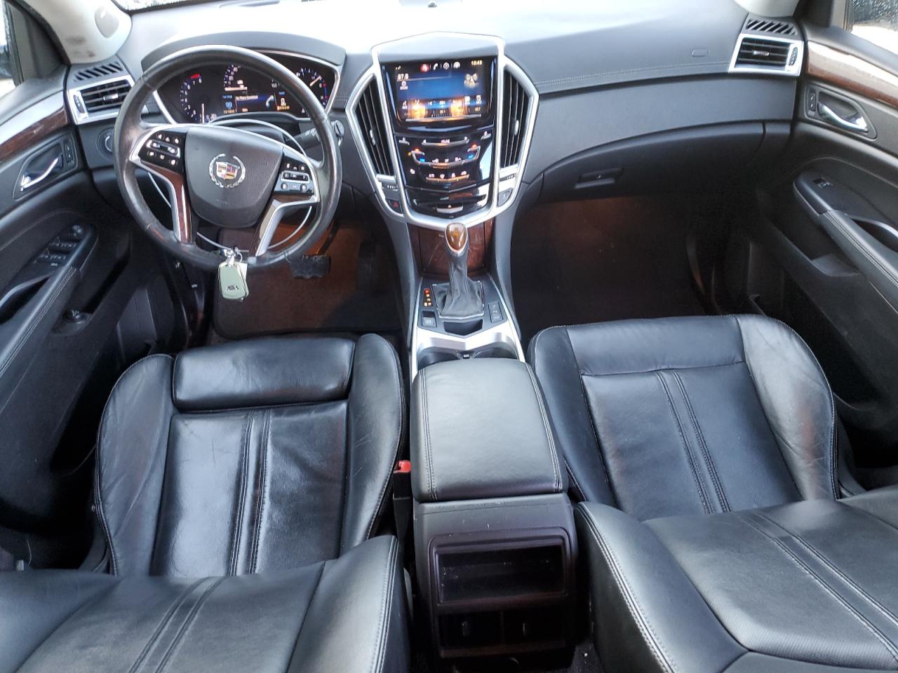 2015 Cadillac SRX VIN 3GYFNBE34FS558665 Copart auction photo, front end / minor dent/scratches damage thumbnail 8
