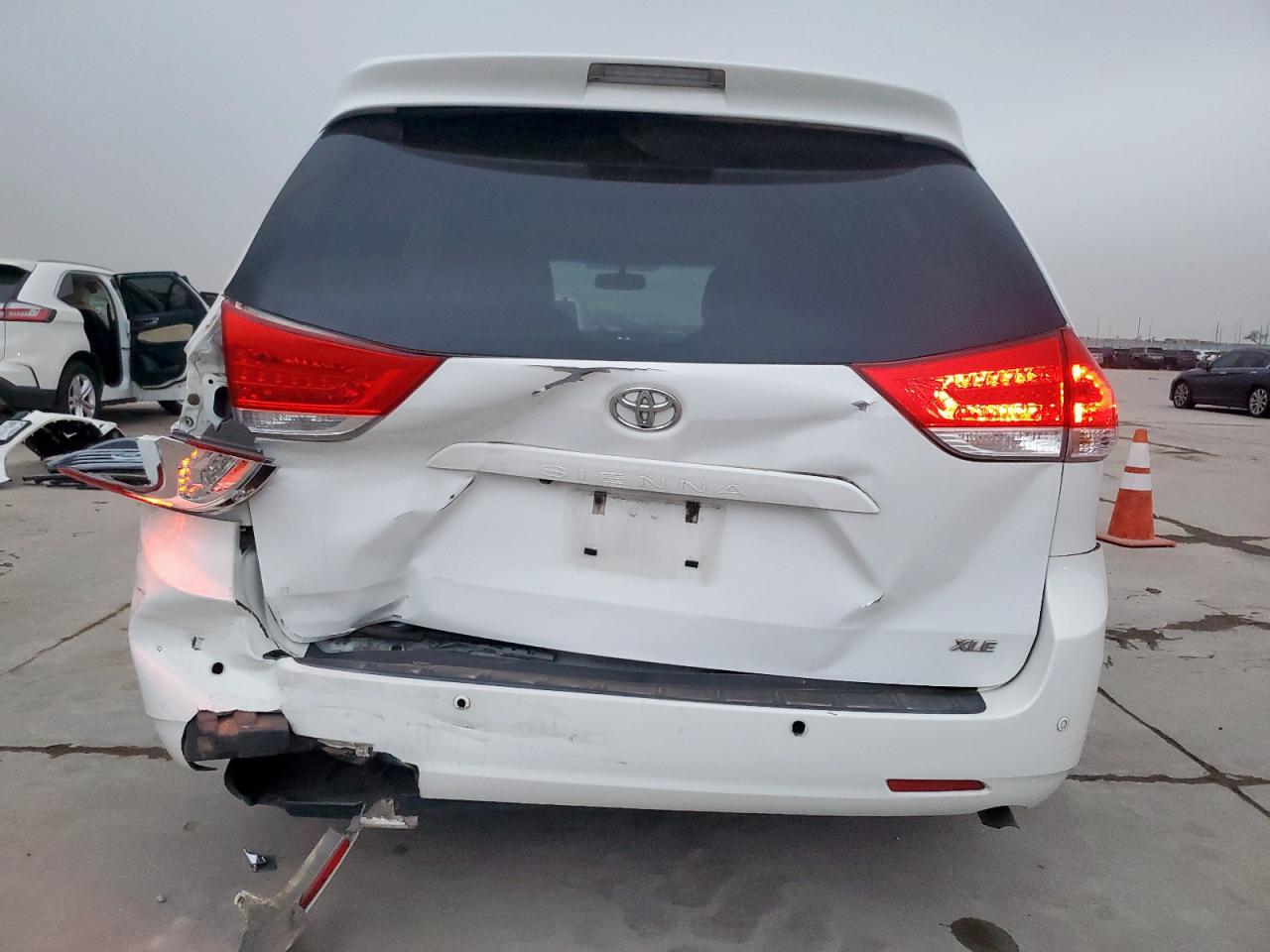 2014 Toyota Sienna VIN 5TDYK3DC8ES468999 Copart auction photo, rear end damage thumbnail 6