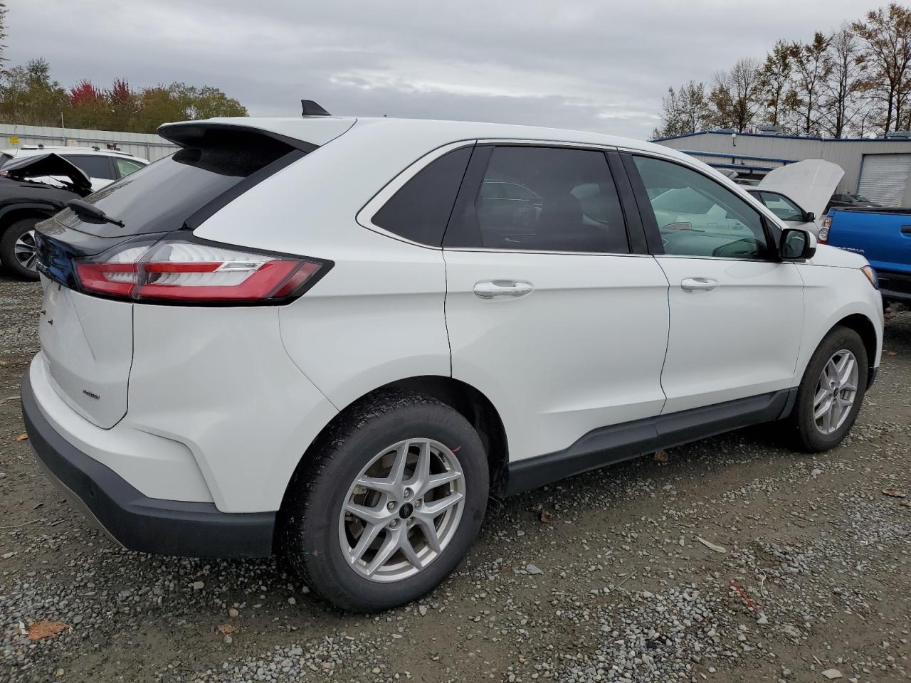 2023 Ford Edge VIN 2FMPK4J90PBA39592 Copart auction photo, rear end / side damage thumbnail 3