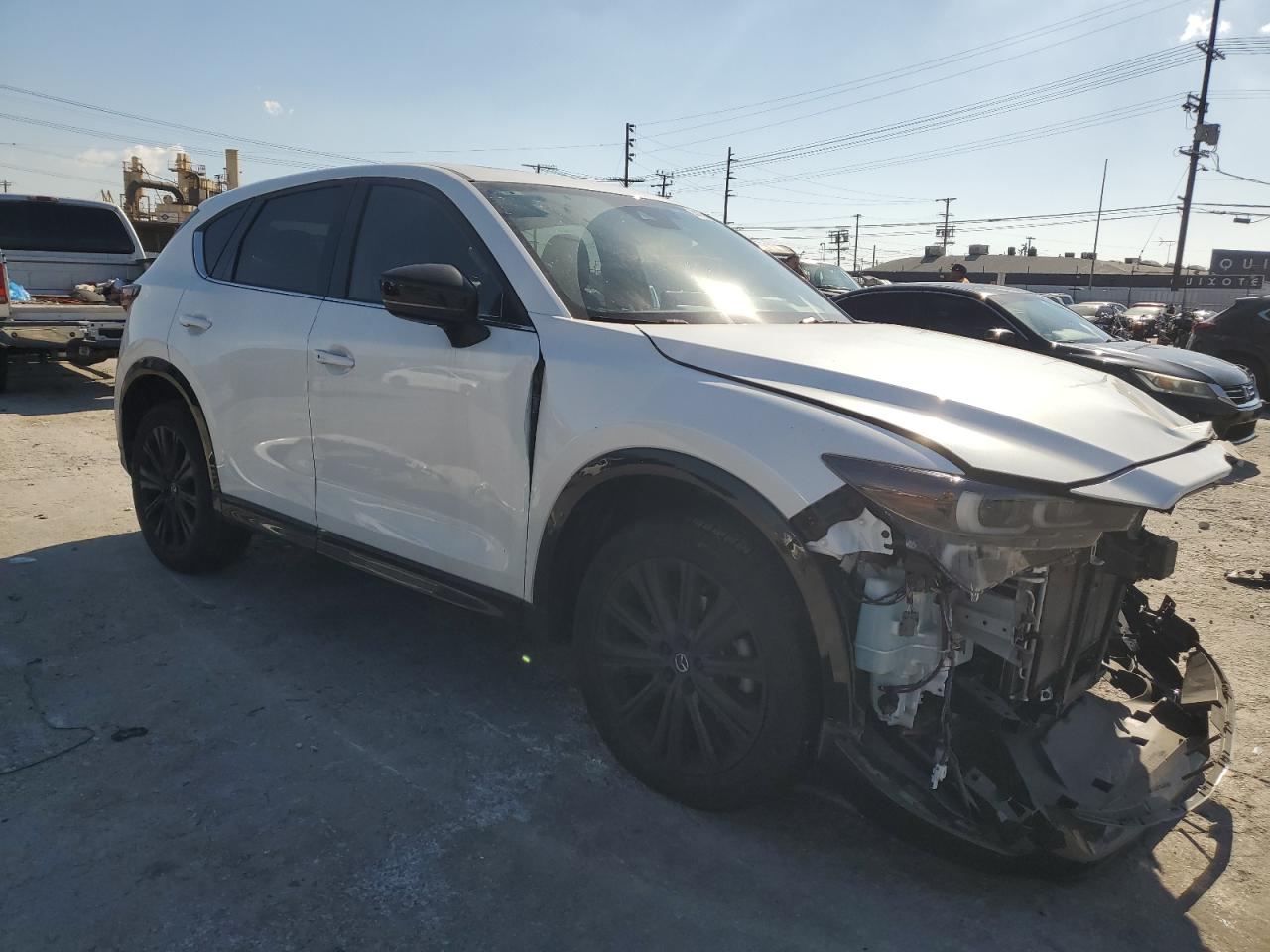 2022 Mazda CX-5 VIN JM3KFBAY5N0525299 Copart auction photo, front end / side damage thumbnail 4