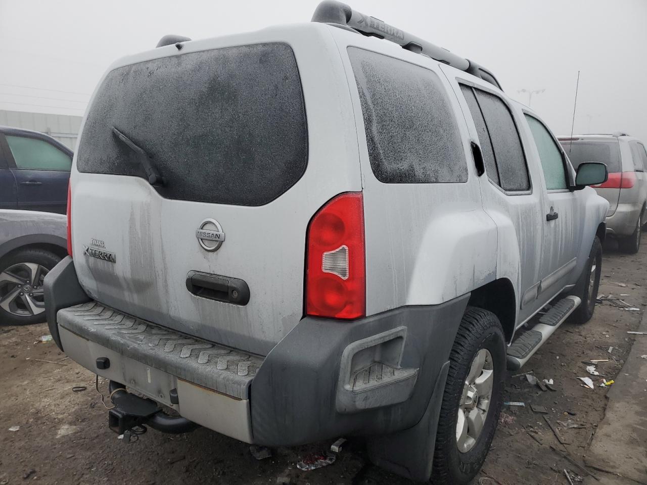 2011 Nissan XTerra VIN 5N1AN0NW3BC500122 Copart auction photo, front end / side damage thumbnail 3