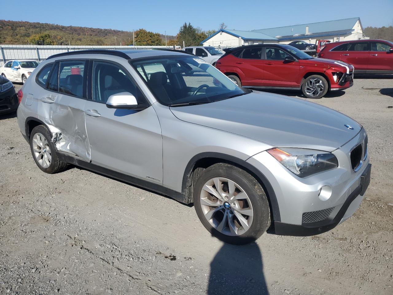 2014 BMW X1 VIN WBAVL1C54EVR95044 Copart auction photo, side / minor dent/scratches damage thumbnail 4