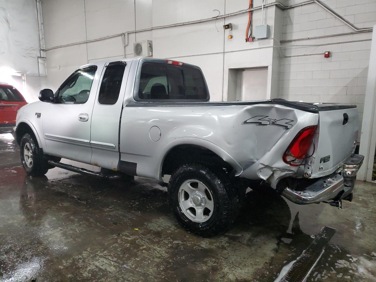 2000 Ford F-150 VIN 1FTRX18L5YNA41830 Copart auction photo, rear end damage thumbnail 2