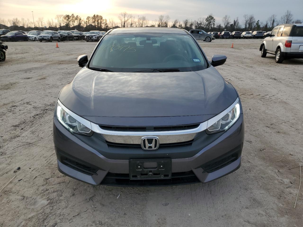 2016 Honda Civic VIN 19XFC2F57GE034647 Copart auction photo, side / minor dent/scratches damage thumbnail 5