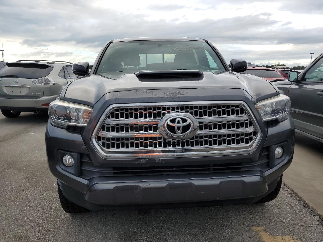 2017 Toyota Tacoma VIN 3TMAZ5CNXHM033661 Copart auction photo, water/flood damage thumbnail 5