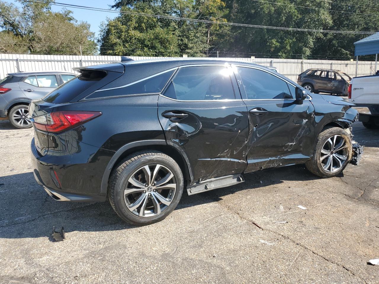 2019 Lexus RX VIN 2T2ZZMCA6KC144309 Copart auction photo, side / front end damage thumbnail 3