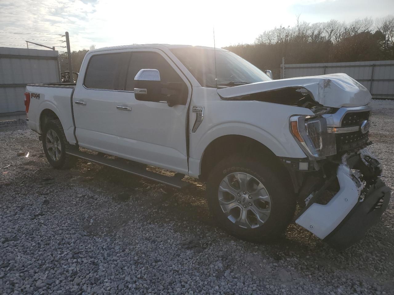 2021 Ford F-150 VIN 1FTFW1E88MFA38009 Copart auction photo, front end / side damage thumbnail 4