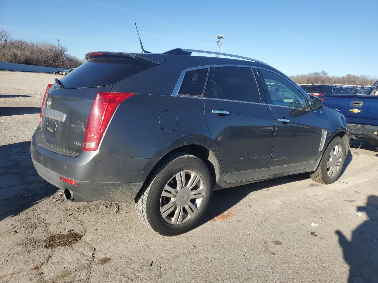 2013 Cadillac SRX VIN 3GYFNGE33DS580697 Copart auction photo, front end / minor dent/scratches damage thumbnail 3