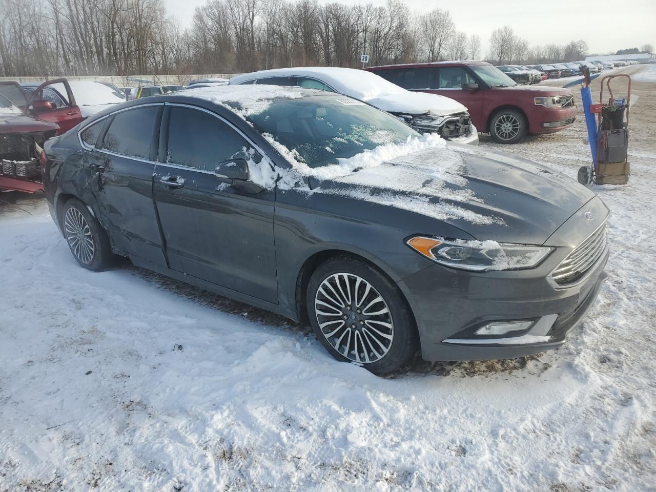 2017 Ford Fusion VIN 3FA6P0T94HR101317 Copart auction photo, side / minor dent/scratches damage thumbnail 4