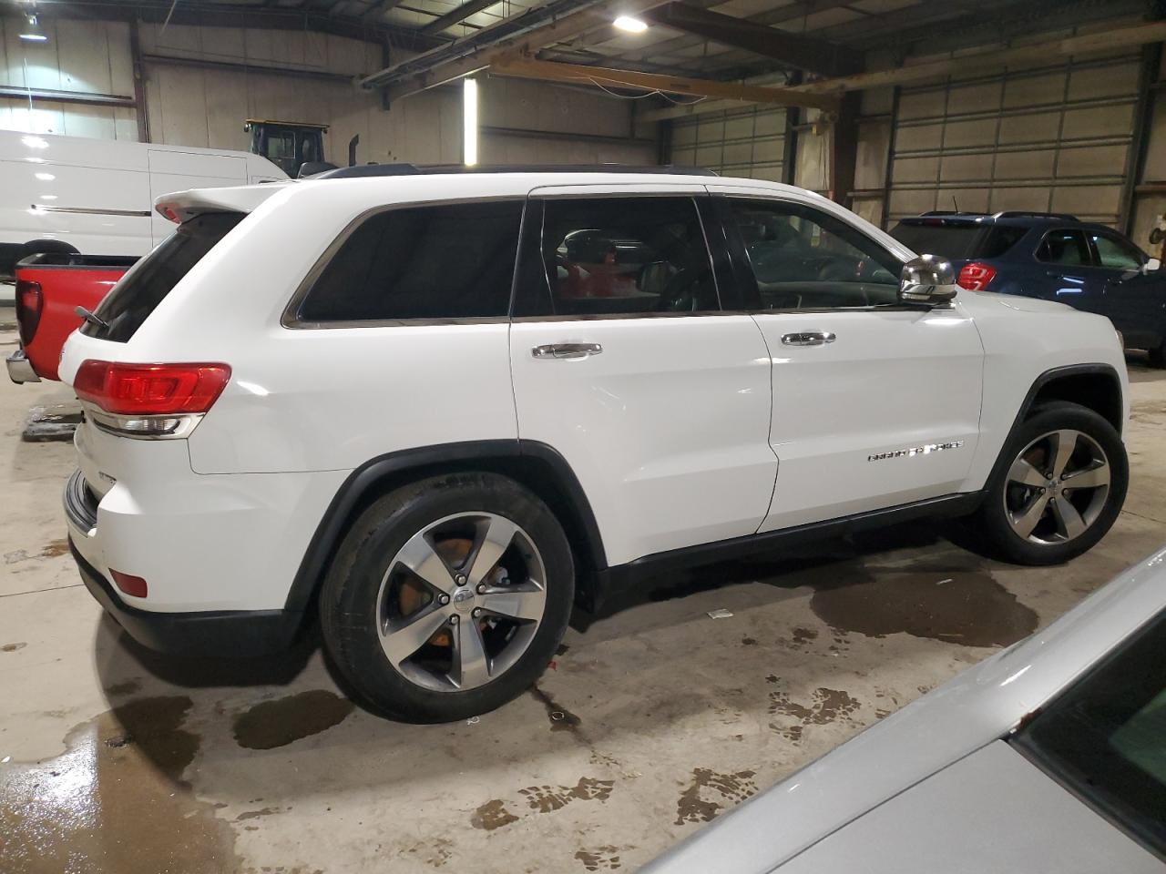 2015 Jeep Grand Cherokee VIN 1C4RJFBG5FC609125 Copart auction photo, rear end / undercarriage damage thumbnail 3