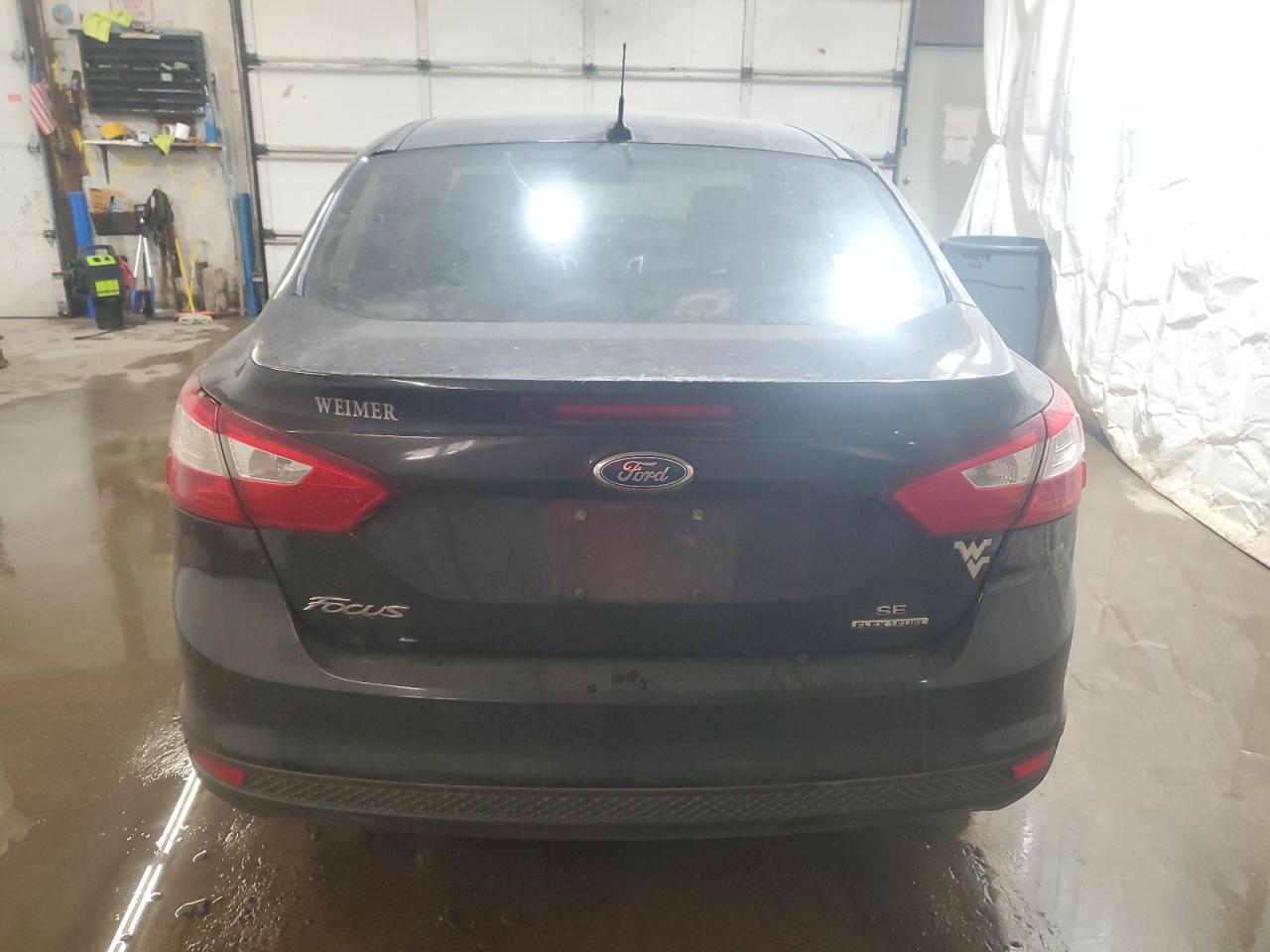 2013 Ford Focus VIN 1FADP3F2XDL208159 Copart auction photo, front end / undercarriage damage thumbnail 6