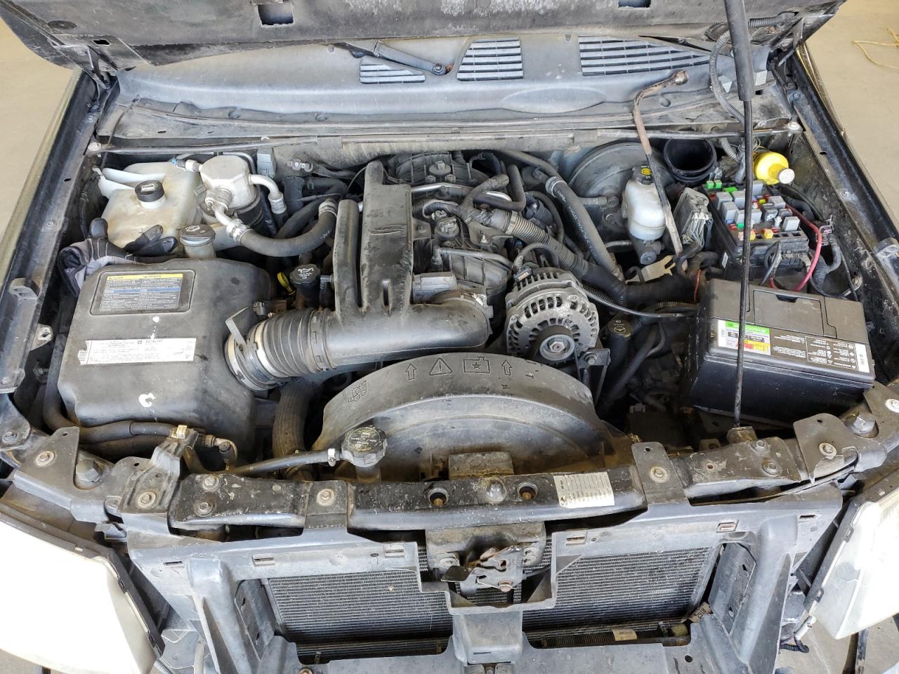 2006 GMC Envoy VIN 1GKET66M766102335 Copart auction photo, front end / side damage thumbnail 12