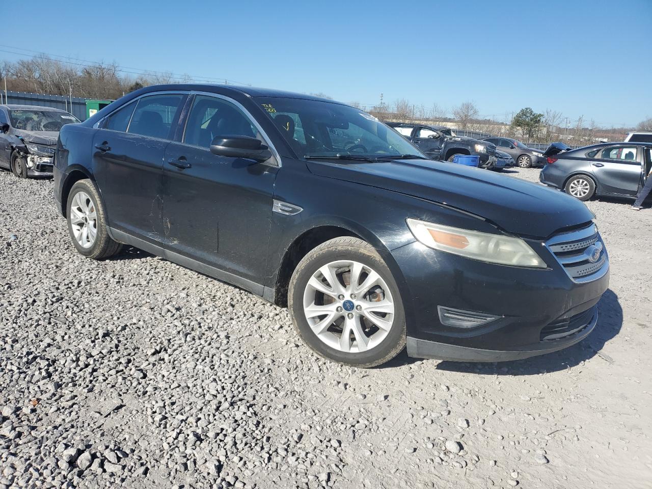 2012 Ford Taurus VIN 1FAHP2EW2CG116857 Copart auction photo, side damage thumbnail 4