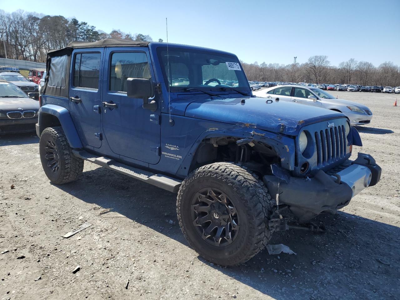 2010 Jeep Wrangler VIN 1J4HA5H11AL143608 Copart auction photo, front end damage thumbnail 4