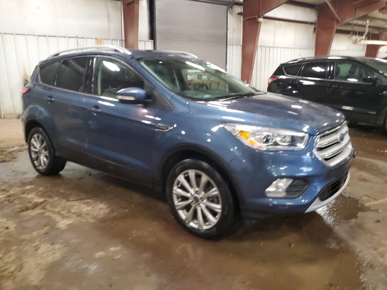 2018 Ford Escape VIN 1FMCU9J92JUB54010 Copart auction photo, side / front end damage thumbnail 4