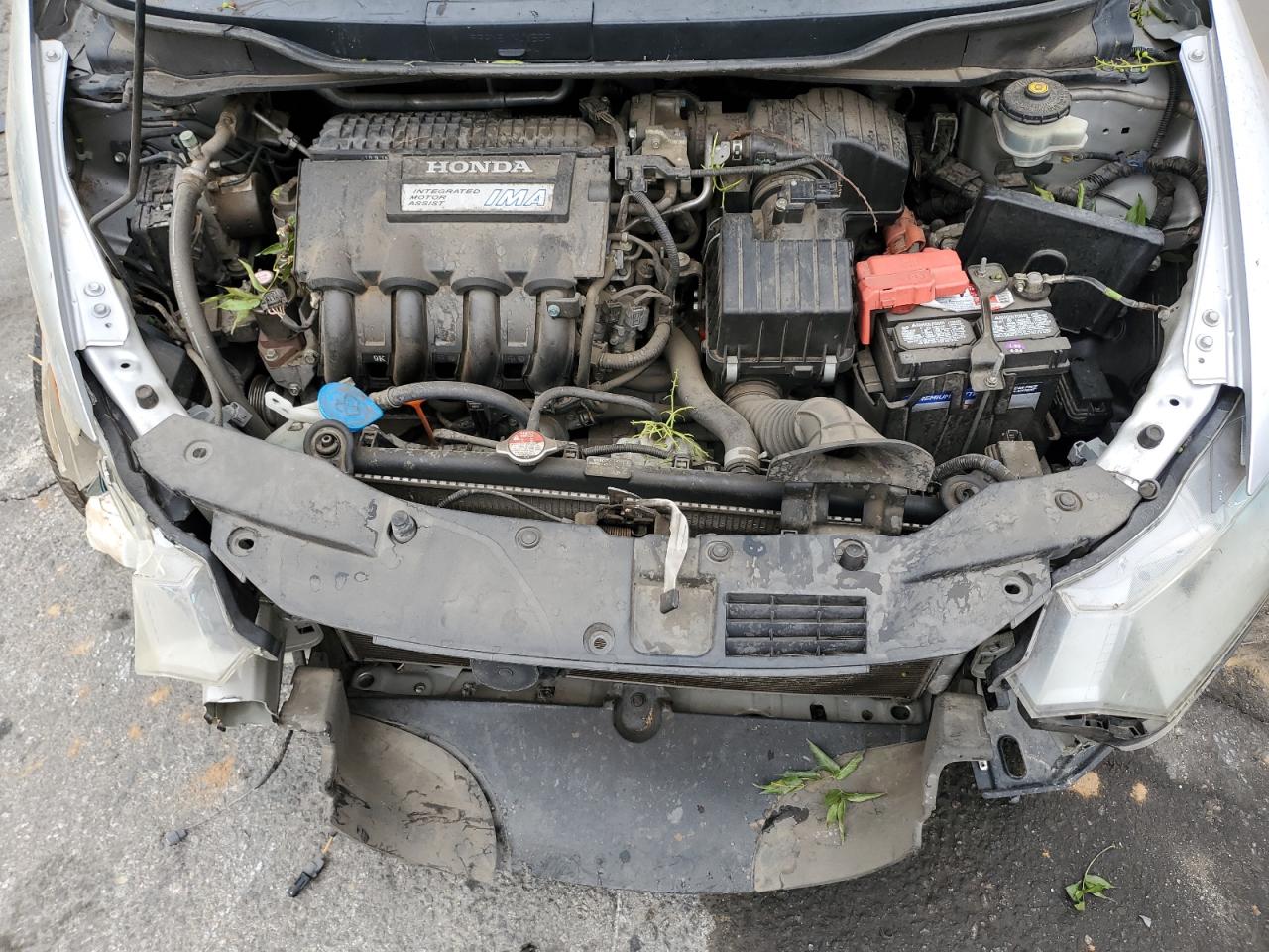 2010 Honda Insight VIN JHMZE2H56AS043184 Copart auction photo, all over damage thumbnail 12