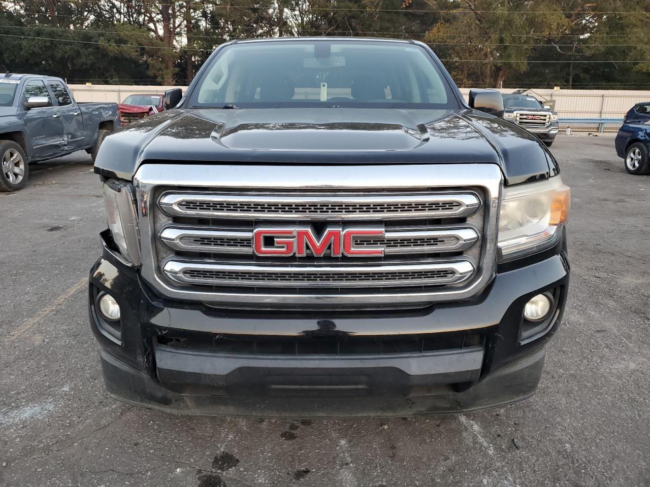 2016 GMC Canyon VIN 1GTG5CE32G1323779 Copart auction photo, side / front end damage thumbnail 5