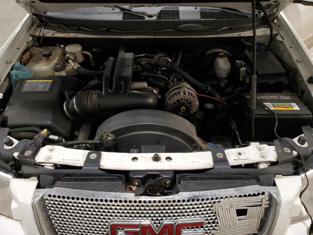 2006 GMC Envoy VIN 1GKET63MX62286634 Copart auction photo, all over damage thumbnail 14