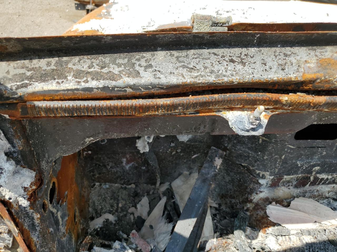 2014 Jeep Wrangler VIN 1C4BJWFG5EL100369 Copart auction photo, burn damage thumbnail 9