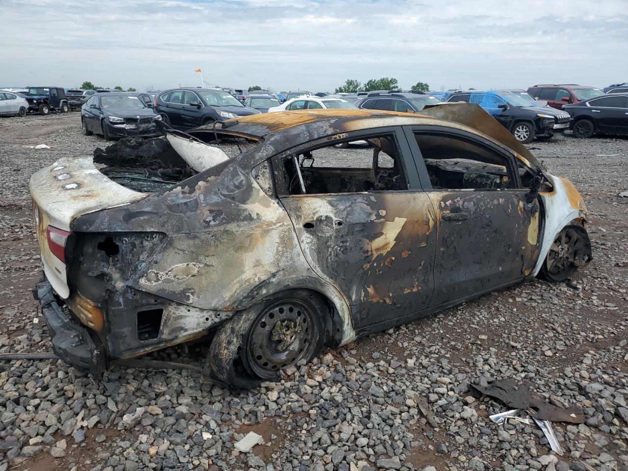 2015 KIA Rio VIN KNADM4A39F6432837 Copart auction photo, burn / burn - interior damage thumbnail 3