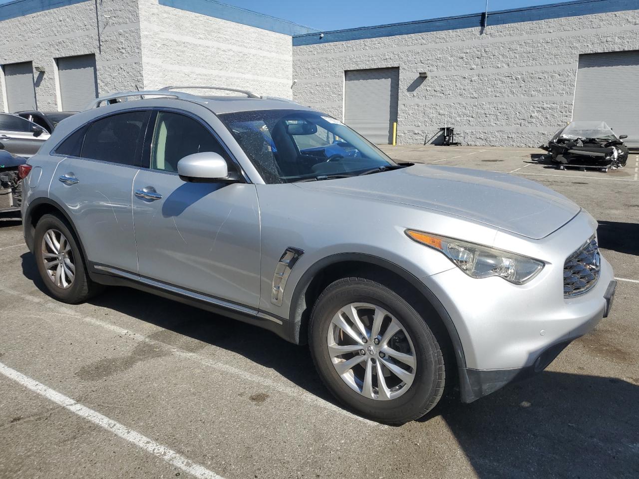 2011 Infiniti FX VIN JN8AS1MUXBM711531 Copart auction photo, vandalism damage thumbnail 4