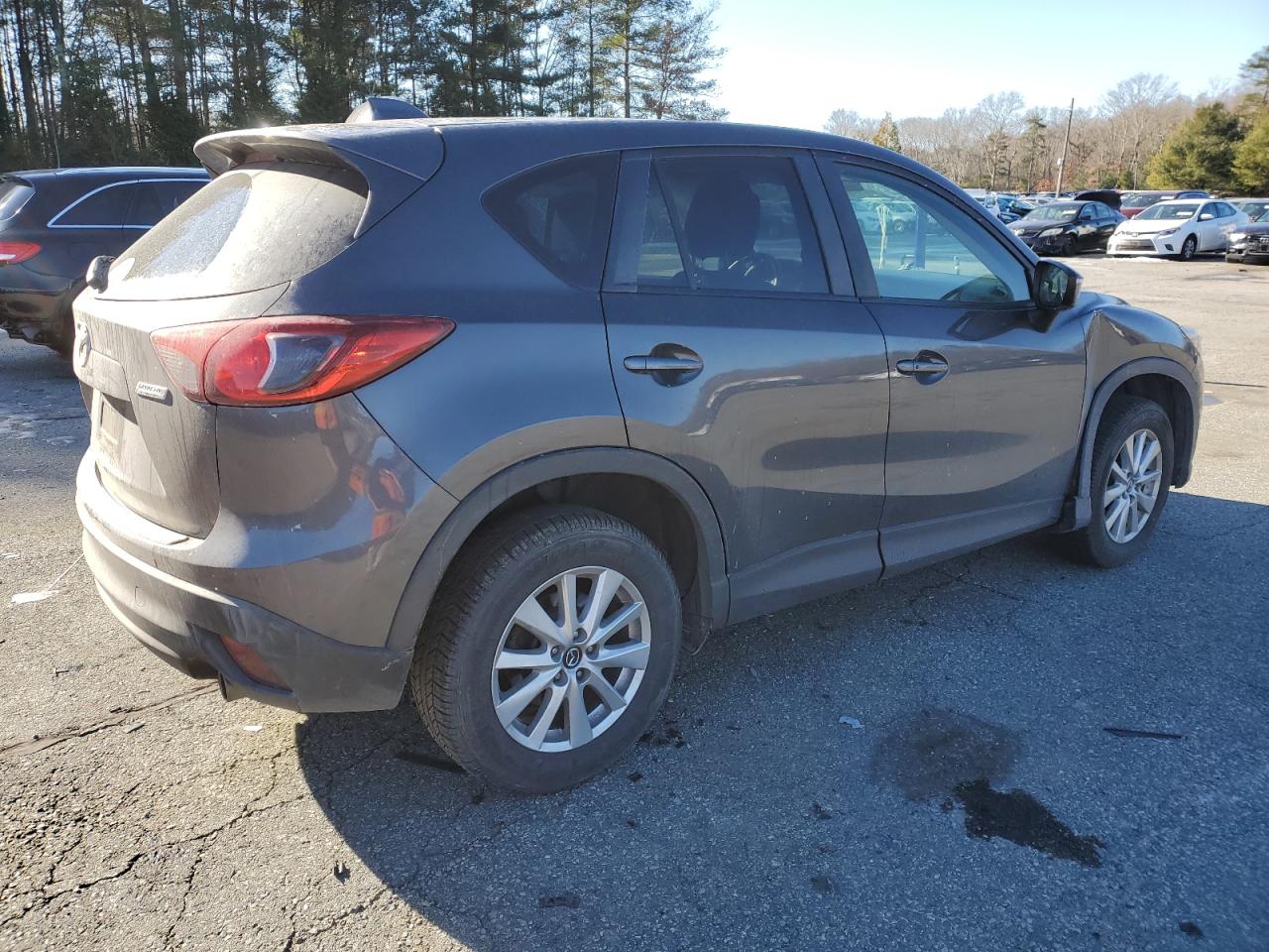 2015 Mazda CX-5 VIN JM3KE4CY1F0527869 Copart auction photo, side / minor dent/scratches damage thumbnail 3