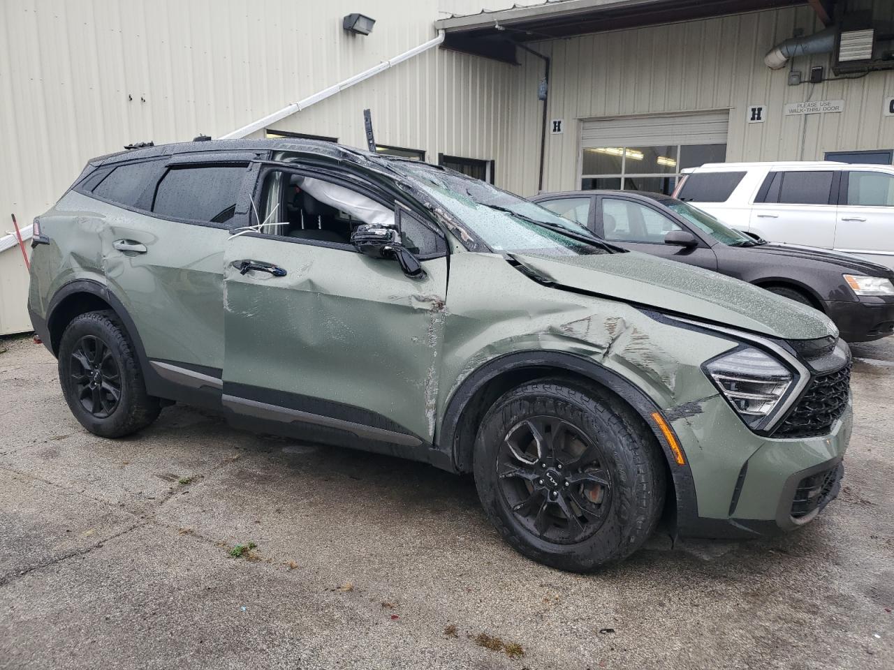 2023 KIA Sportage VIN 5XYK7CAF1PG013563 Copart auction photo, rollover damage thumbnail 4