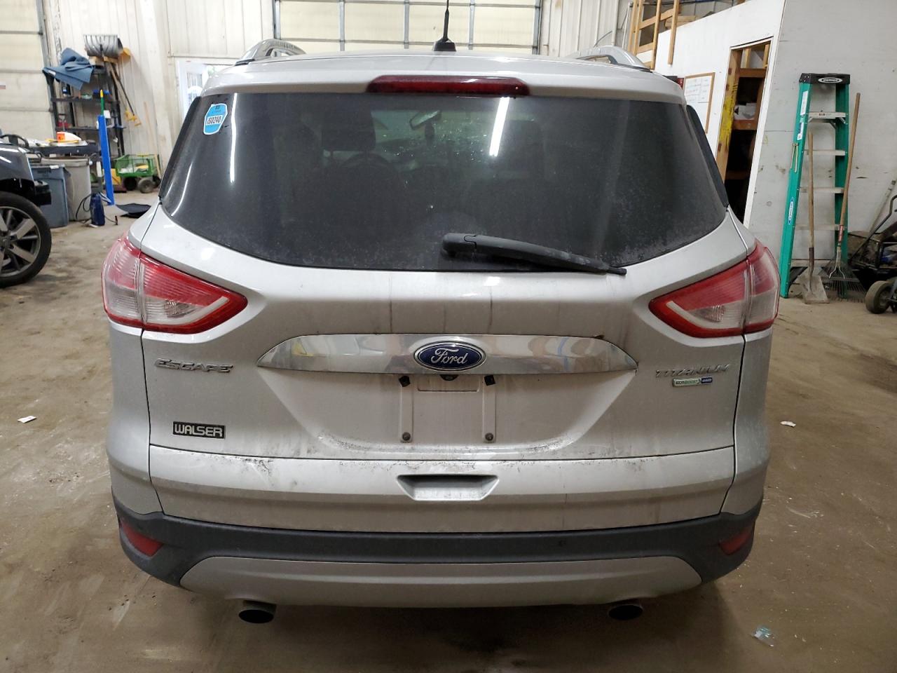 2015 Ford Escape VIN 1FMCU9JXXFUA43131 Copart auction photo, rollover damage thumbnail 6