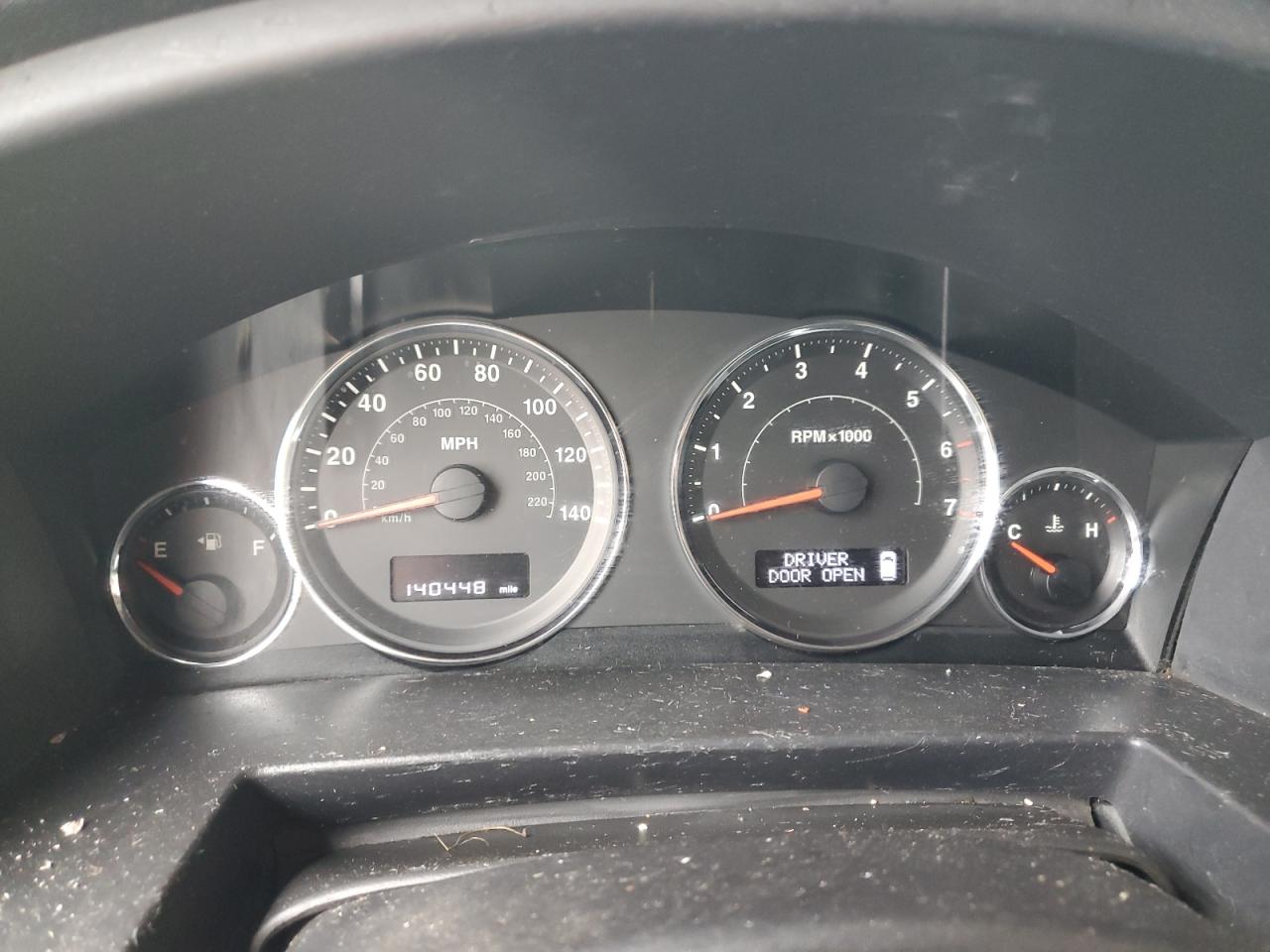 2010 Jeep Commander VIN 1J4RG4GK0AC127858 Copart auction photo, front end damage thumbnail 9