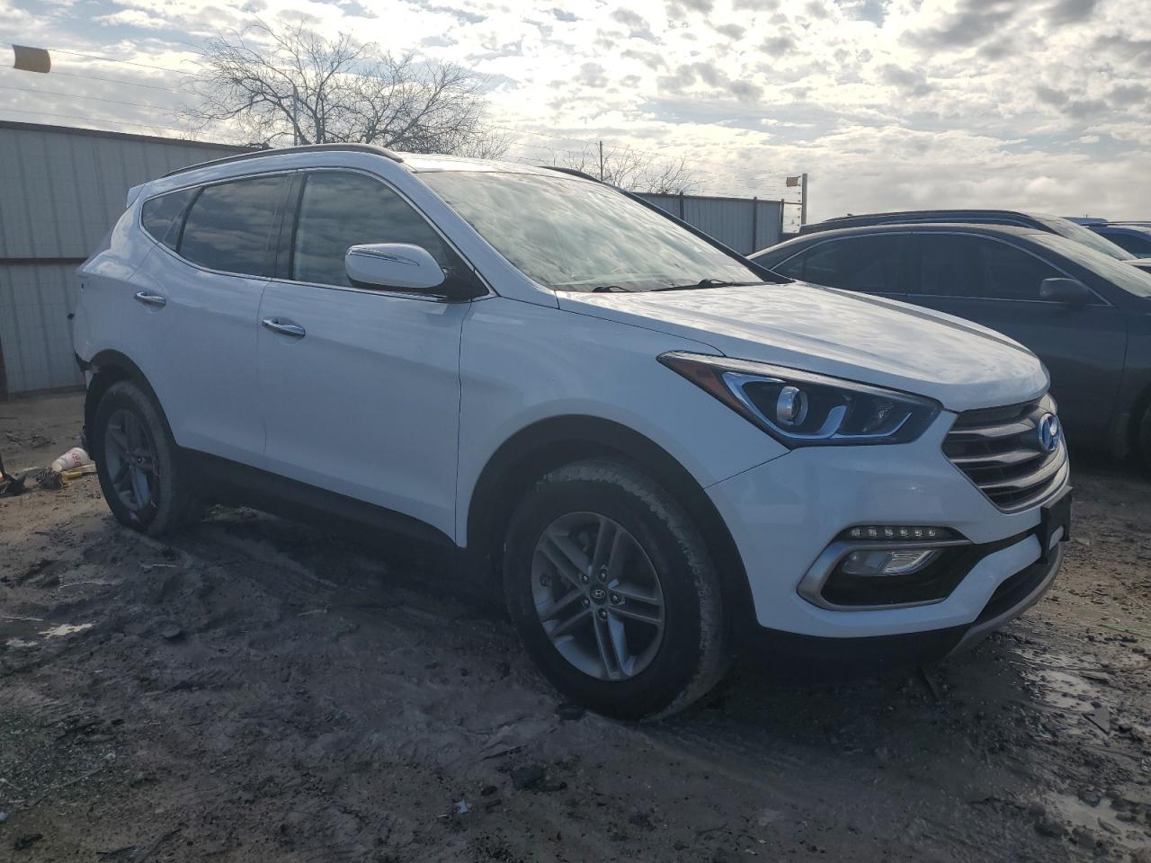 2017 Hyundai Santa Fe VIN 5NMZUDLB6HH030177 Copart auction photo, rear end damage thumbnail 4