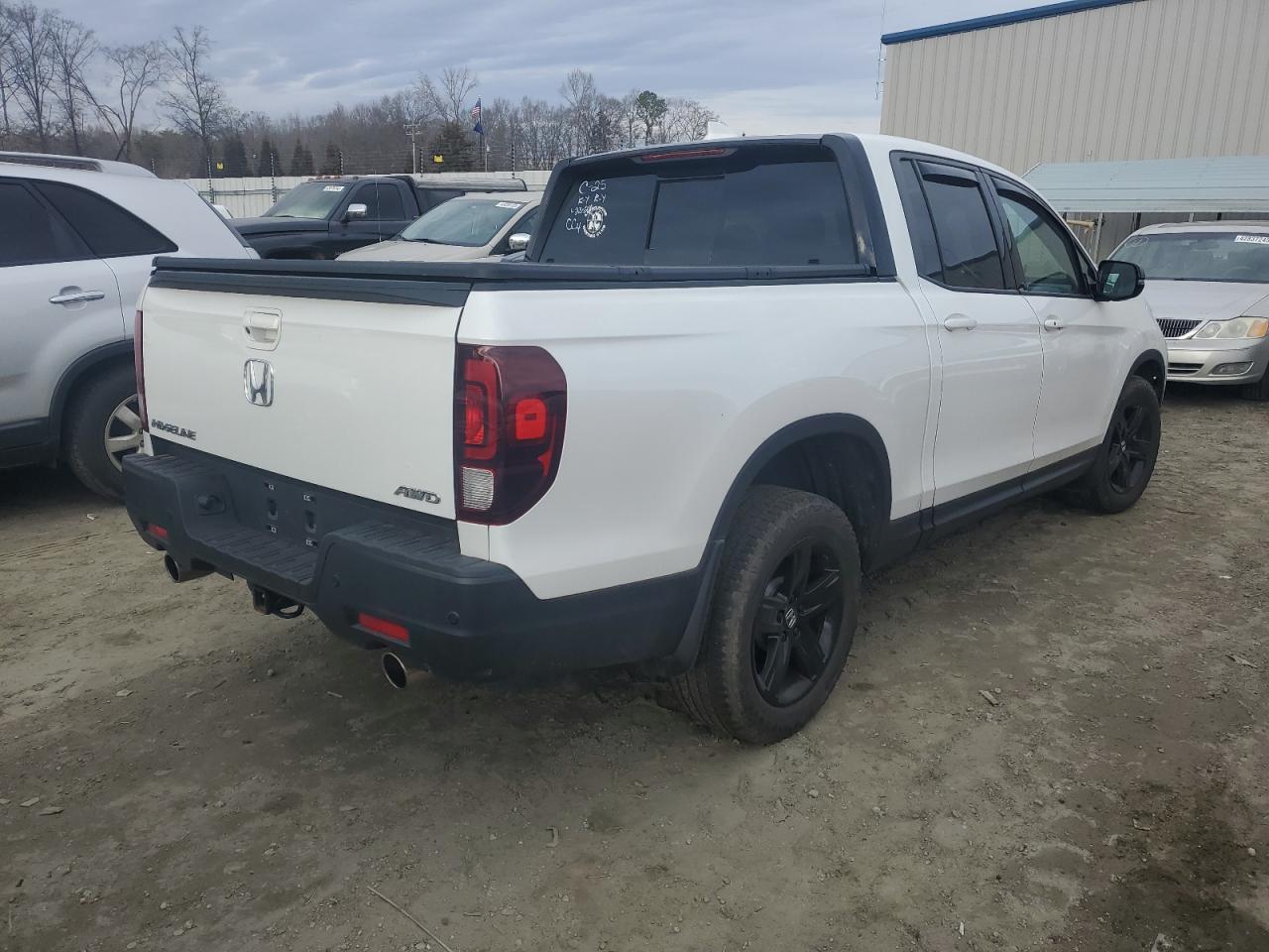2022 Honda Ridgeline VIN 5FPYK3F85NB002760 Copart auction photo, side damage thumbnail 3