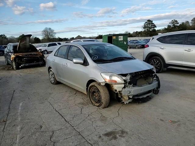 2010 Toyota Yaris VIN JTDBT4K38A4067521 Copart auction photo, front end / rear end damage thumbnail 11